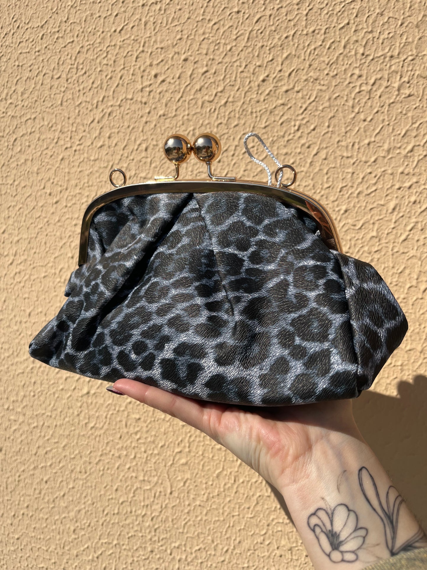 Pochette leopardato scuro